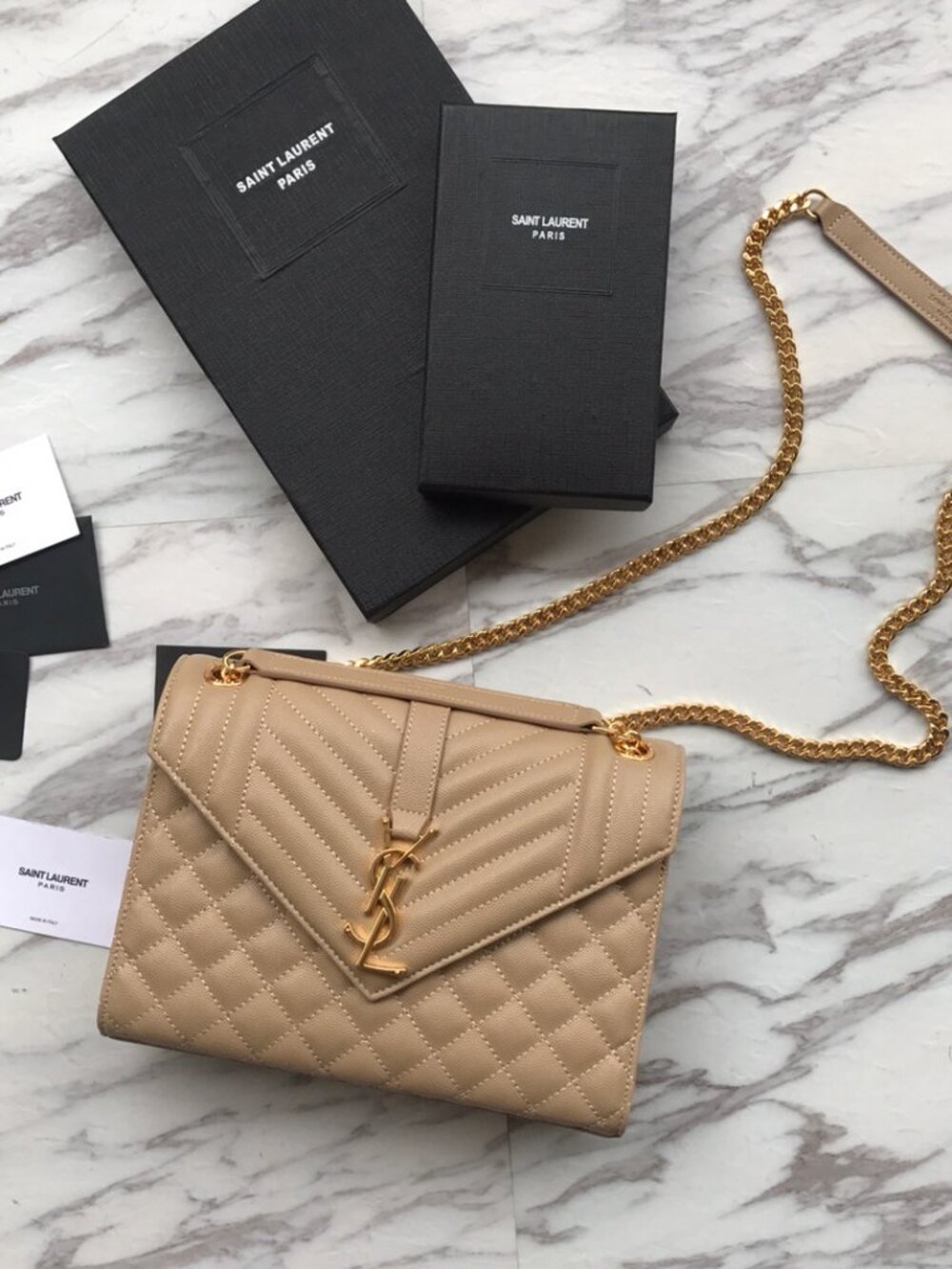 Saint Laurent's new classic quilted messenger bag, flap handbag.